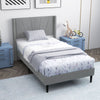 Twin bed frame showcasing a wingback headboard with exquisite quilting and breathable fabric for added comfort.