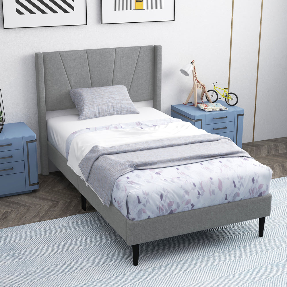 Twin bed frame showcasing a wingback headboard with exquisite quilting and breathable fabric for added comfort.
