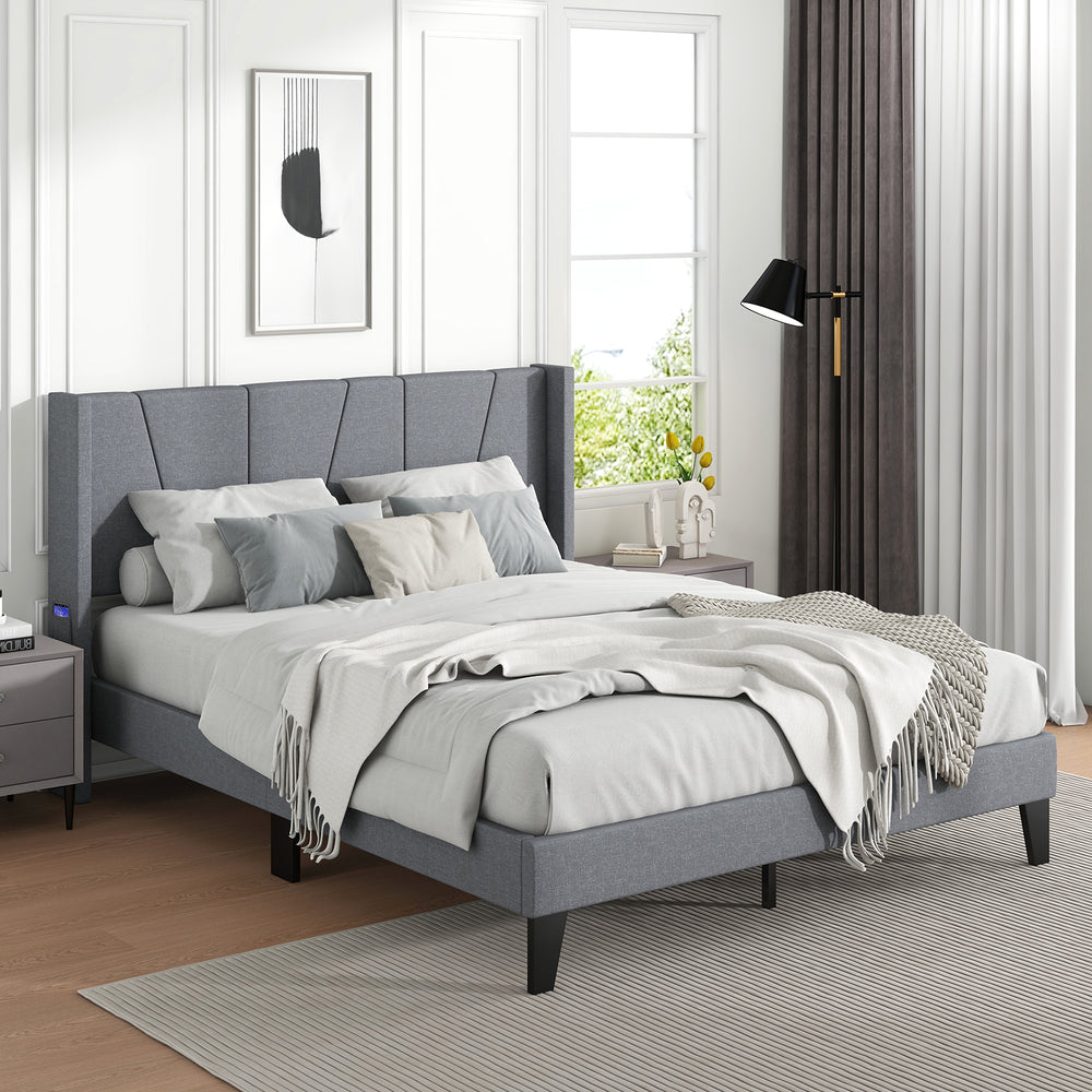 Full/Queen size bed frame with wingback headboard, upholstered fabric, and wood slat support for enhanced comfort.