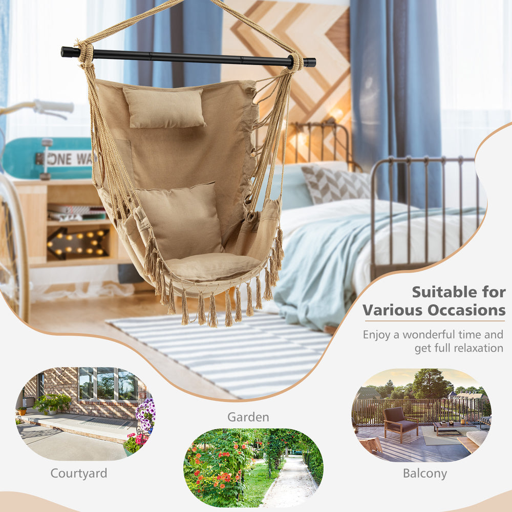 Hanging rope swing chair in beige with soft pillow and cushions, perfect for garden relaxation and stylish decor.