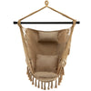 Close-up of the hanging rope swing chair in beige, showcasing soft cushions and stylish tassels for added comfort and.