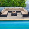 10-piece outdoor wicker conversation set with beige cushions, featuring a spacious layout and tempered glass tabletop.