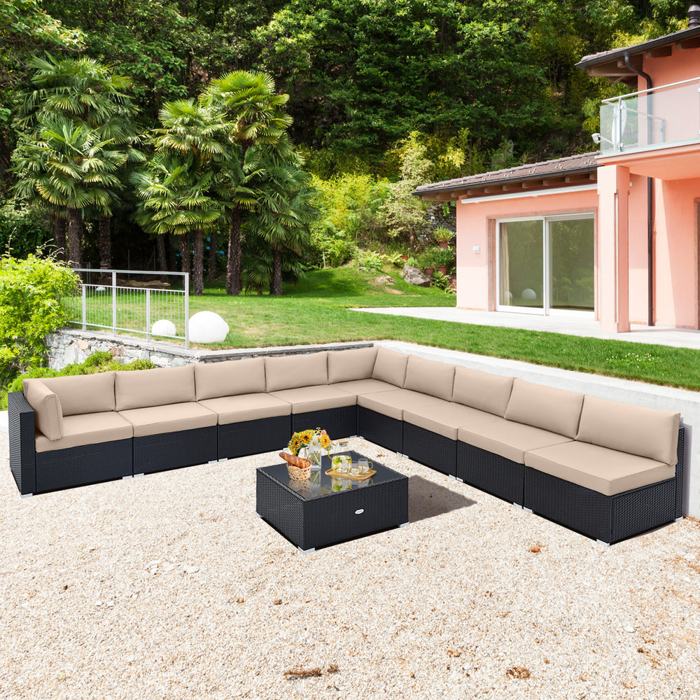 L-shaped 10 piece outdoor wicker conversation set with beige cushions, ideal for spacious patio gatherings.