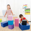 Two children playing with colorful foam building blocks, enhancing creativity and motor skills through imaginative play.