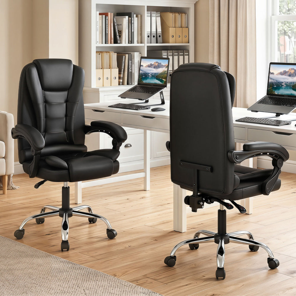 Big high back executive chair in black with linkage armrests, adjustable height, and ergonomic support for office use.