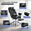 Big and tall executive office chair in black featuring lumbar support, padded armrests, and a retractable footrest for comfort.