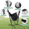 Height adjustable hammock chair in gray with side pocket, phone holder, and tassels for indoor and outdoor relaxation.