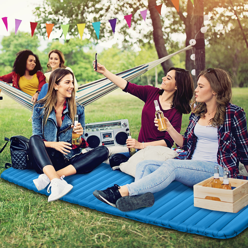 Blue 3-inch thick inflatable camping sleeping pad, perfect for outdoor gatherings and comfortable relaxation.