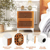 Boho accent table nightstand with handwoven rattan drawers, golden knobs, and round corners for stylish bedroom storage.