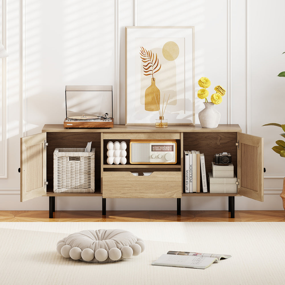 Boho TV stand with natural finish, featuring two cabinets, open shelf, and pull-out drawer for organized storage.