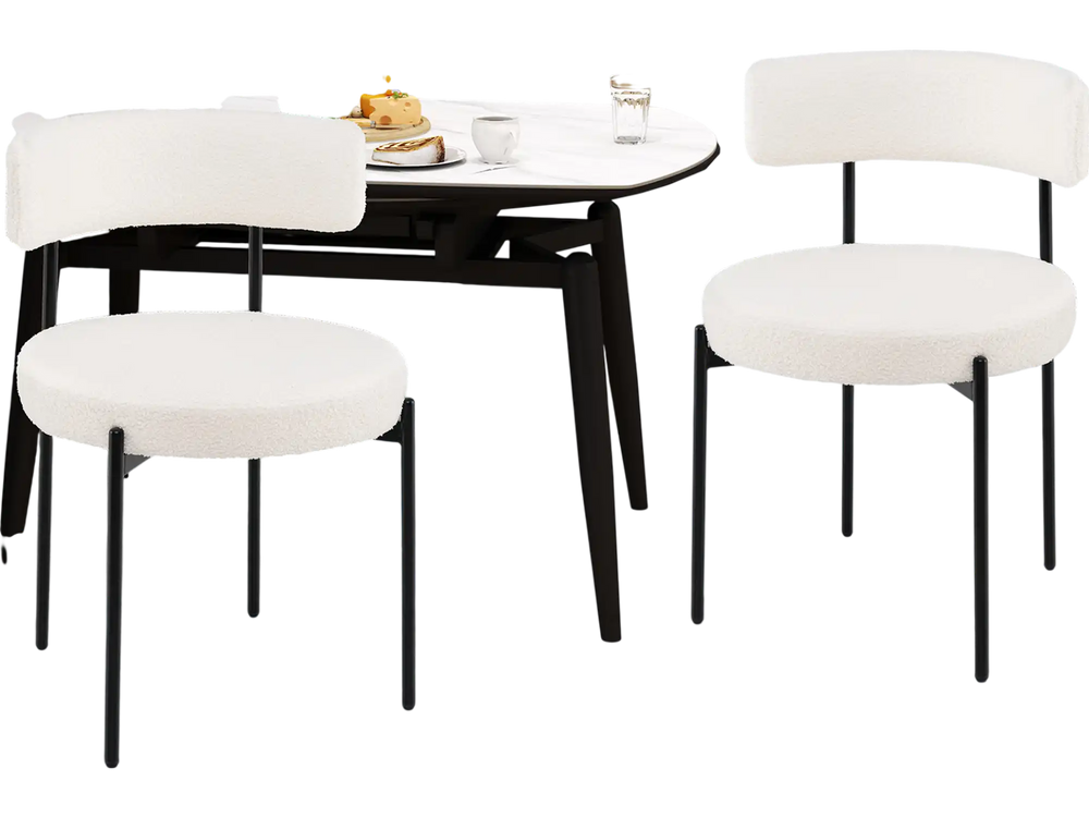 Set of 2 white boucle dining chairs with curved backrests and metal legs, perfect for dining rooms or living spaces.