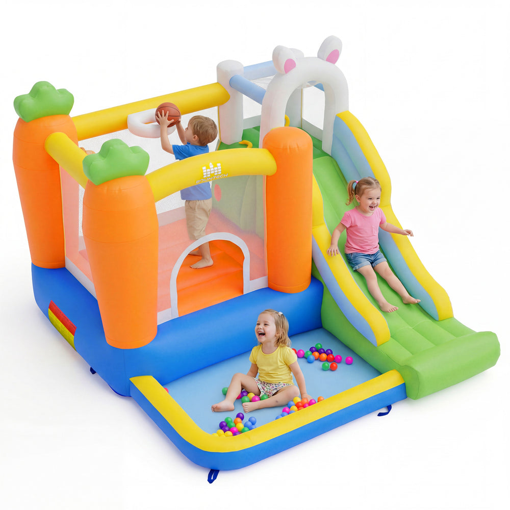 Brightly colored bounce house with climbing wall, slide, and ball pit for kids aged 3-12, perfect for backyard fun.