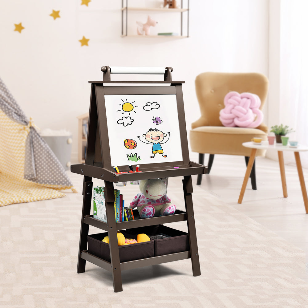 Double-sided brown art easel with magnetic whiteboard, chalkboard, and storage for kids' art supplies in playroom.