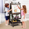 Double-sided brown art easel with magnetic whiteboard and chalkboard, featuring storage trays for kids' art supplies.