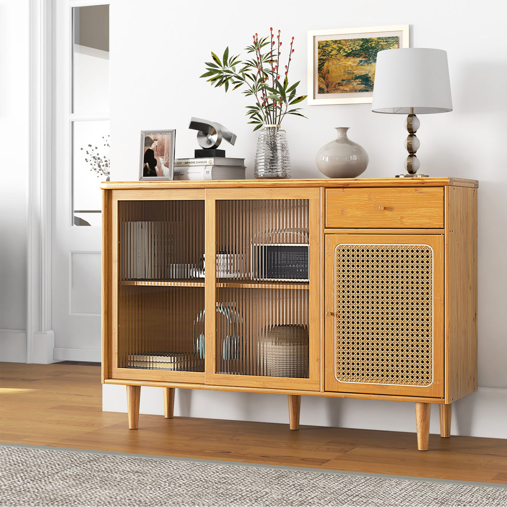 Modern bamboo buffet sideboard cabinet with tempered glass sliding doors, featuring a rattan door for rustic elegance.