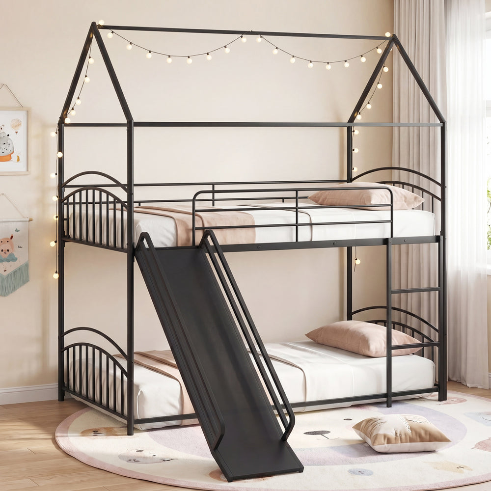 Twin-over-twin black metal bunk bed with slide and ladder, perfect for kids' rooms and shared spaces.