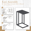 C-shaped side table in dark gray with adjustable foot pads, easy assembly in 3 steps for living room or bedroom use.