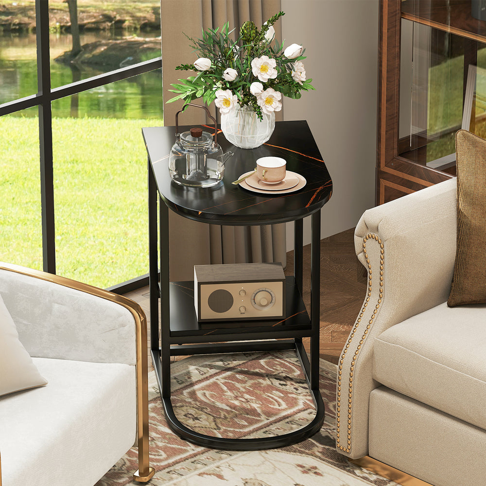 C-shaped modern side table with faux marble tabletop and storage shelf, perfect for tight spaces in living rooms.