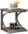 C-shaped grey end table with spacious top and bottom shelf, perfect for lamps and storage in small spaces.