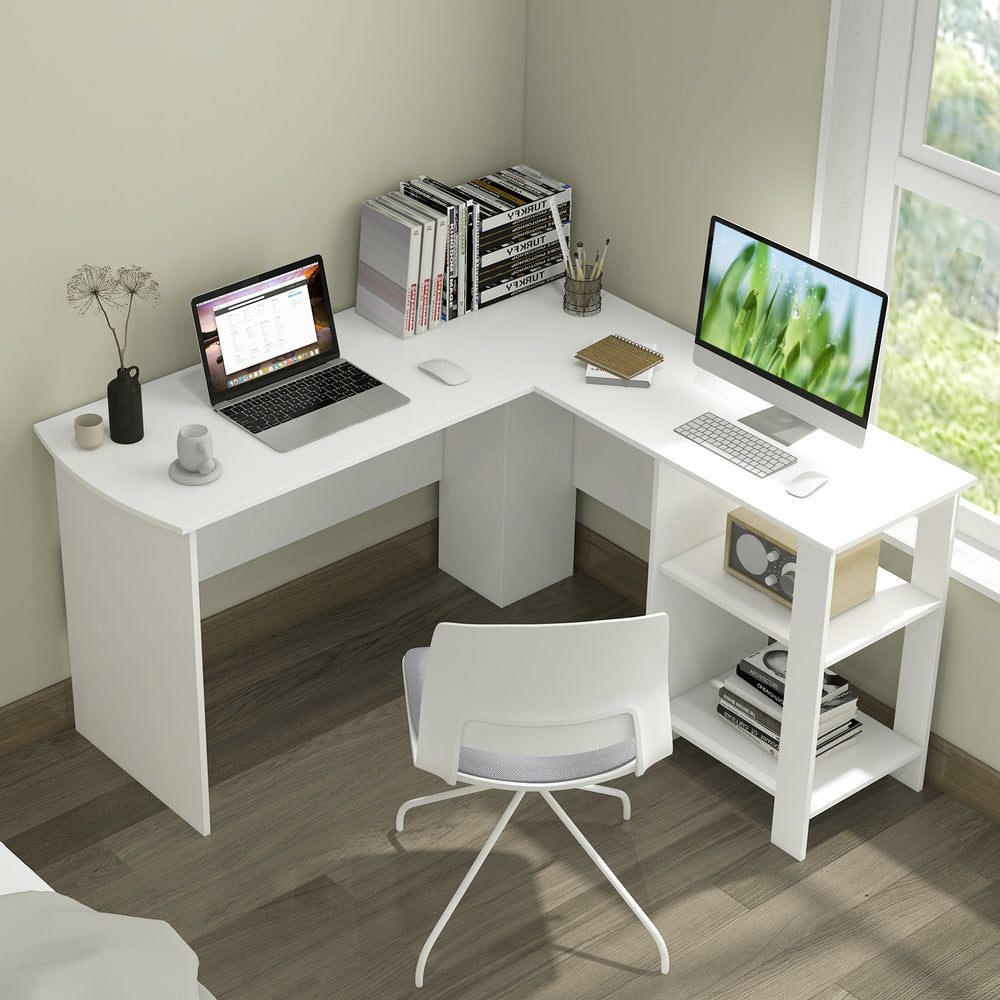 L-shaped white computer desk with large tabletop, two storage shelves, and cable holes for organized workspace.