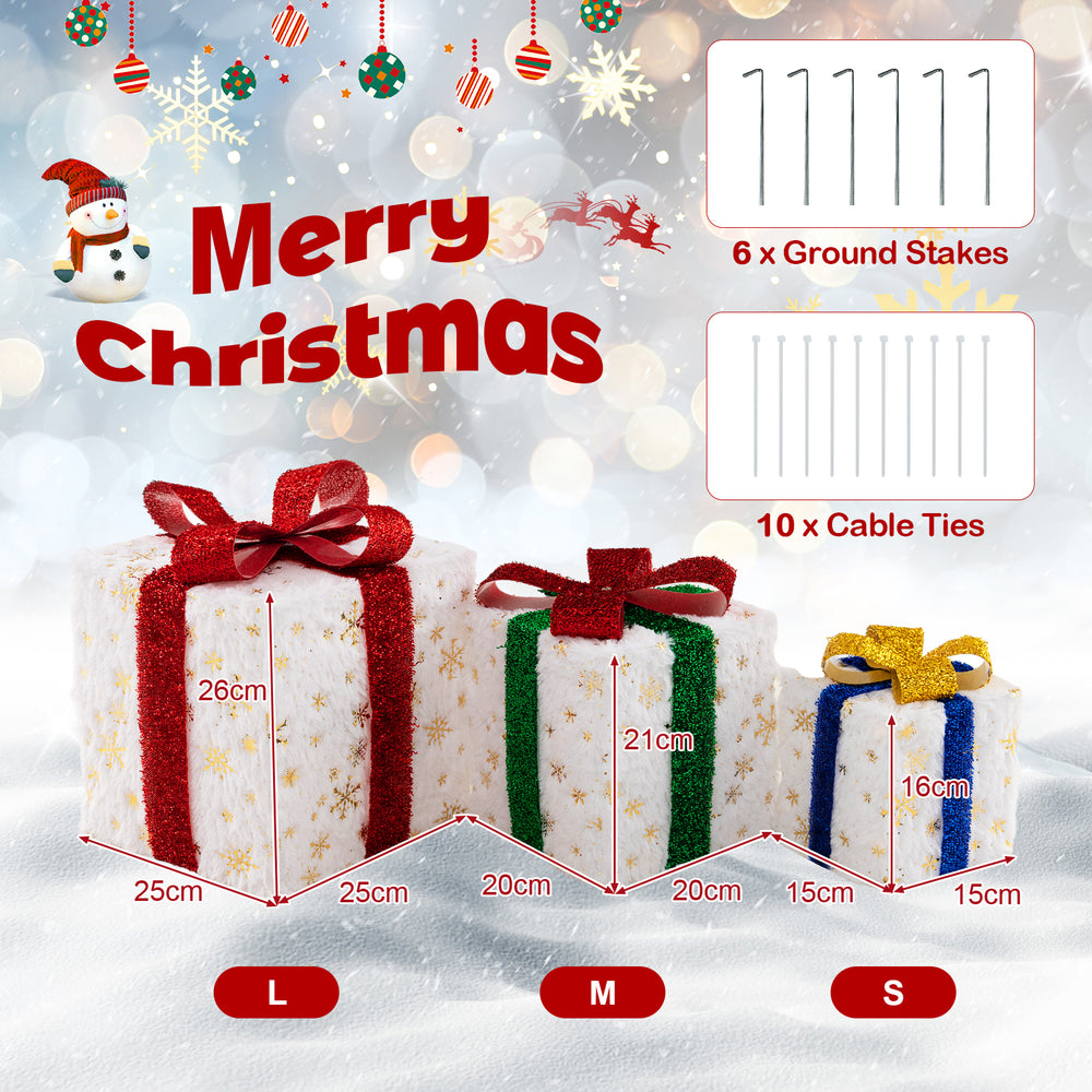 Set of 3 Christmas lighted gift boxes with colorful ribbons, snowflake patterns, and 48 warm lights for festive.