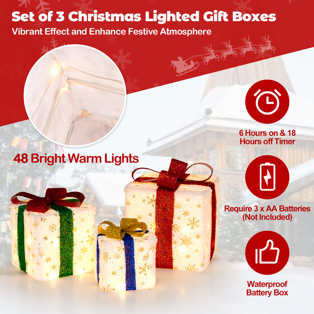 Small Christmas lighted gift box with green ribbon, snowflake pattern, and 48 warm lights, ideal for festive displays.
