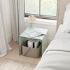C-shaped end table with tempered glass top and shelf, ideal for use as a nightstand or coffee table in modern decor.