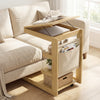 C-shaped end table with adjustable desktop, storage pocket, and wheels for easy mobility beside a sofa in natural wood.