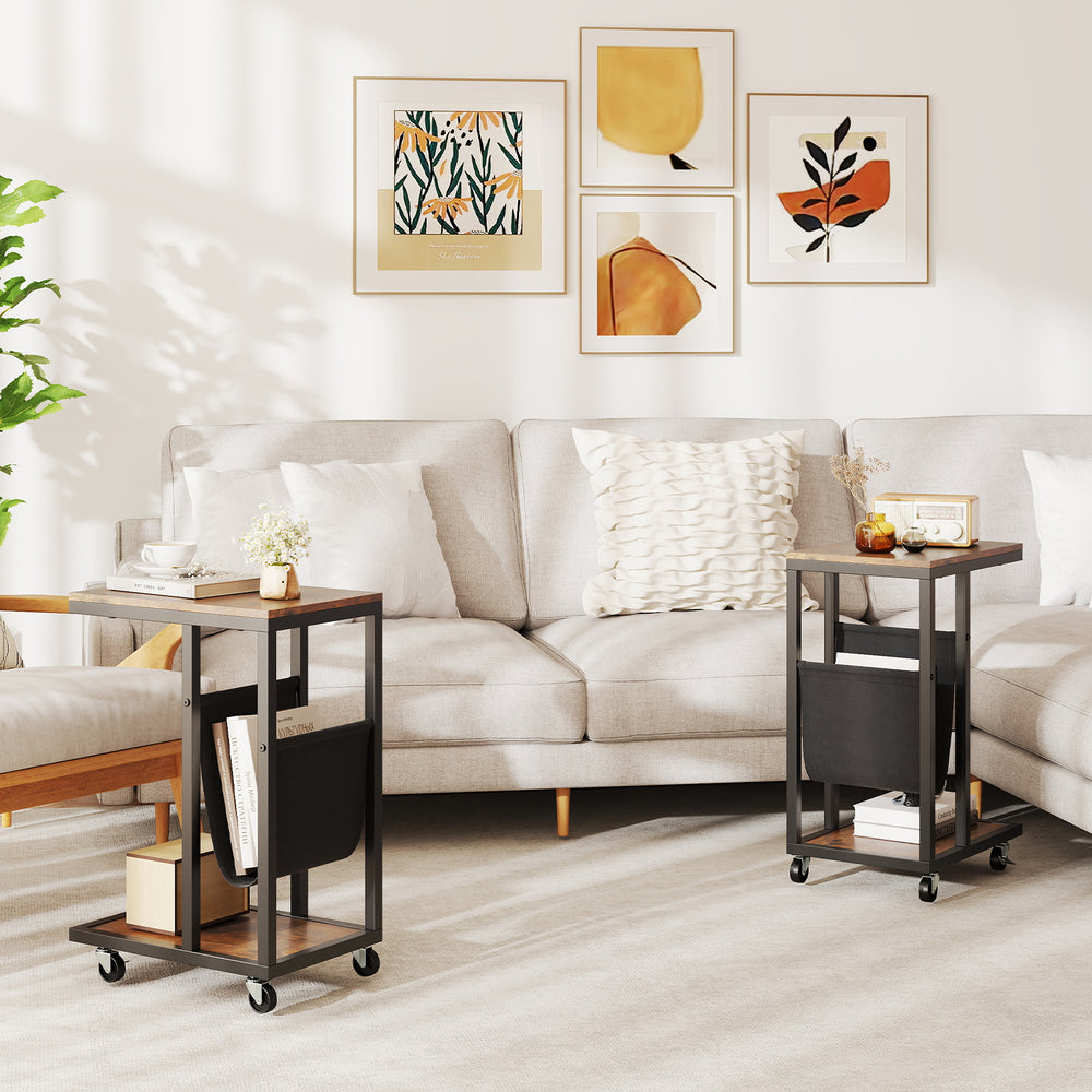 C-shaped side table with a brown metal frame and canvas storage pouch, ideal for small spaces and easy mobility.
