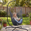 Caribbean hammock chair in gray with decorative tassels, offering breathable comfort and spacious seating for outdoor.