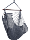 Gray Caribbean hammock chair with metal spreader bar, made of soft-spun rope, suitable for indoor and outdoor use.