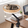 Comfy cat desk bed with removable cushion, mounted on a desk, featuring a jingling ball for playful fun.