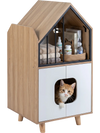 House-shaped modern cat litter box enclosure with storage shelf, double doors, and decorative metal fence for indoor use.