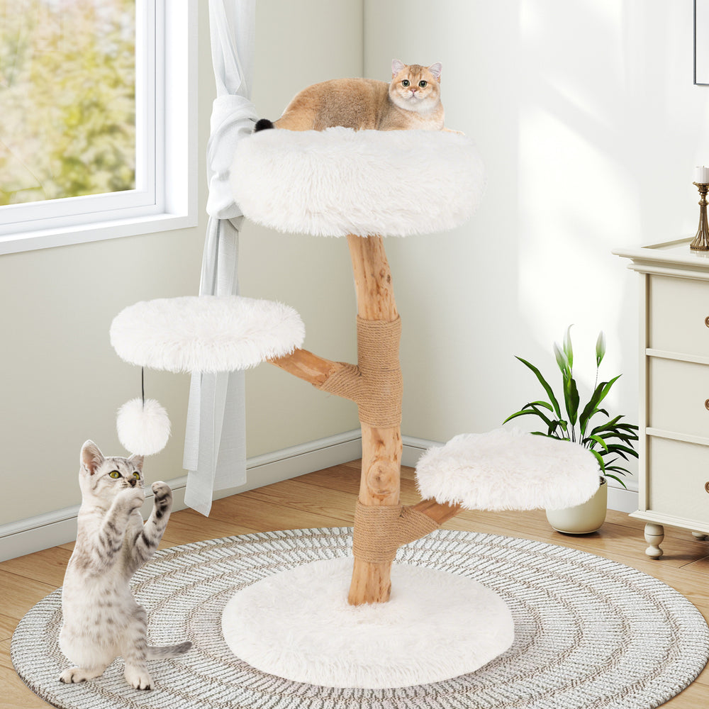 Cat tree made of solid pear wood with white plush perches and natural jute scratching posts for playful cats.