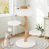 Cat tree made of solid pear wood with white plush perches and natural jute scratching posts for playful cats.
