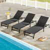 Set of 2 foldable black chaise lounge chairs by the pool, featuring adjustable backrests and breathable fabric for.