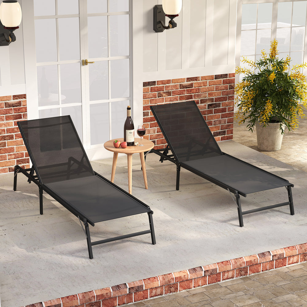 Set of 2 black foldable chaise lounge chairs with adjustable backrests, perfect for patios and outdoor relaxation.
