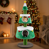 Christmas cat tree in green with two condos, plush beds, and a star toy, perfect for indoor feline holiday fun.