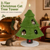 Three-tier Christmas cat tree in green with plush fabric, private hideouts, and dangling ornaments for playful exploration.