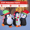 Christmas inflatable penguin family with LED lights, made of durable polyester fabric, perfect for festive outdoor.
