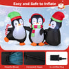 Christmas inflatable penguins family with LED lights, made of durable polyester, perfect for festive indoor or outdoor.
