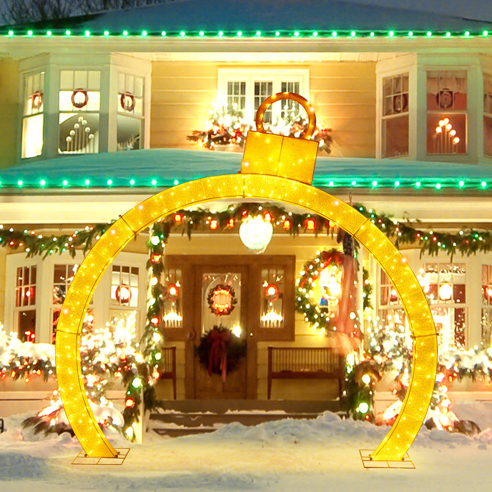 Large 10.5-foot Christmas pre-lit arch with gold ornament cap and 300 warm white LED lights for festive outdoor decor.