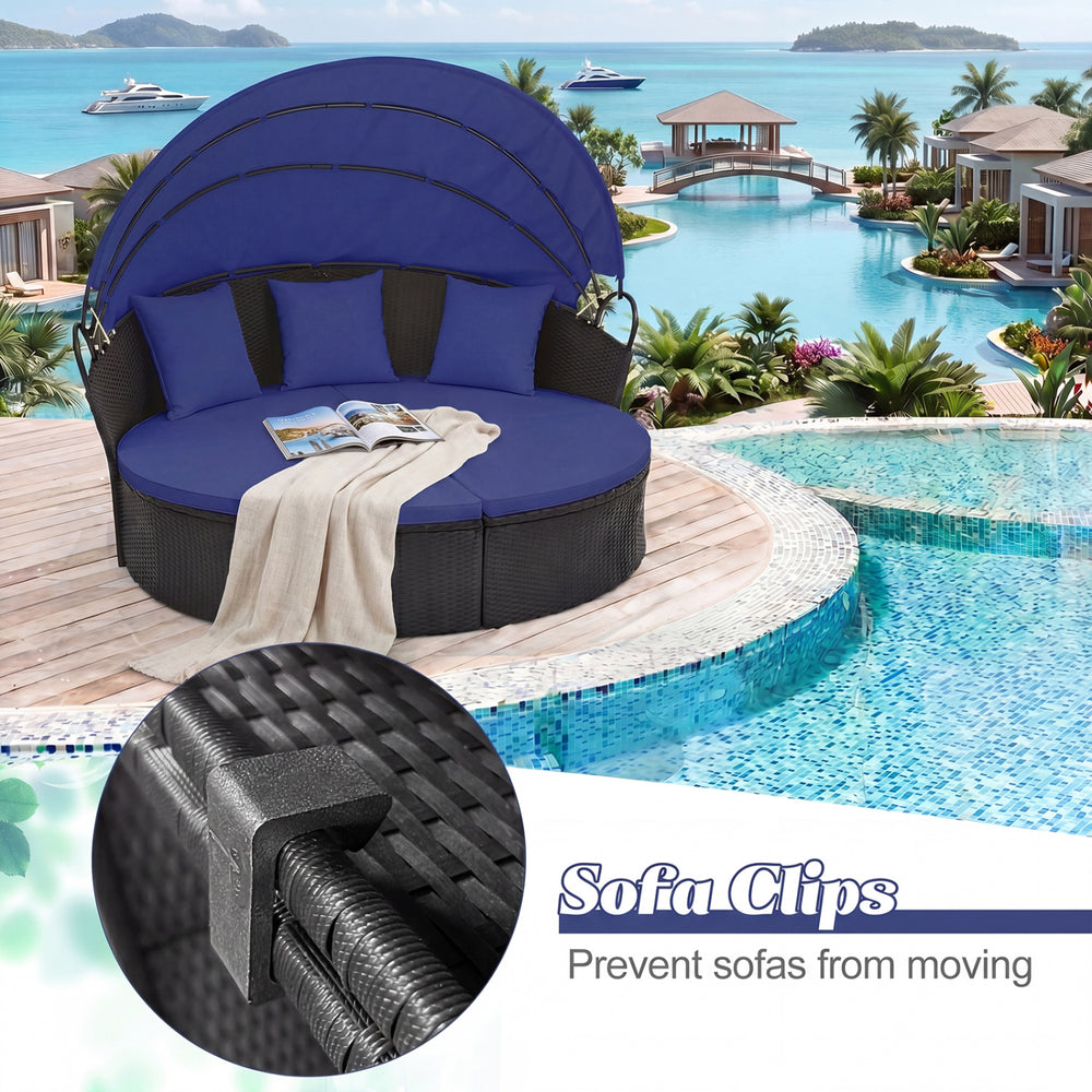 Clamshell patio round daybed in blue wicker with retractable canopy, ideal for outdoor relaxation by the pool.
