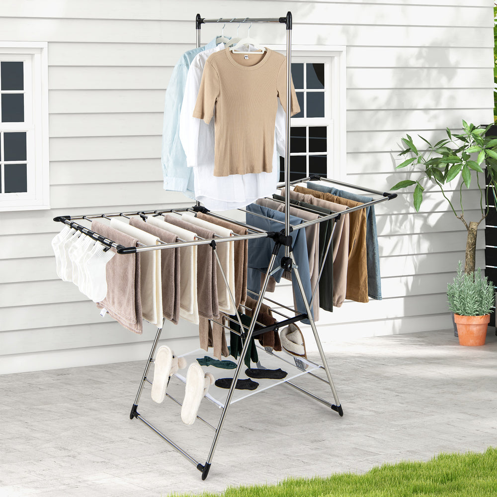 Clothes drying rack with adjustable height, featuring a stable structure and ample capacity for various items outdoors.