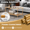 2-tier coffee table with tempered glass top, golden powder-coated metal, featuring adjustable foot pads for stability.