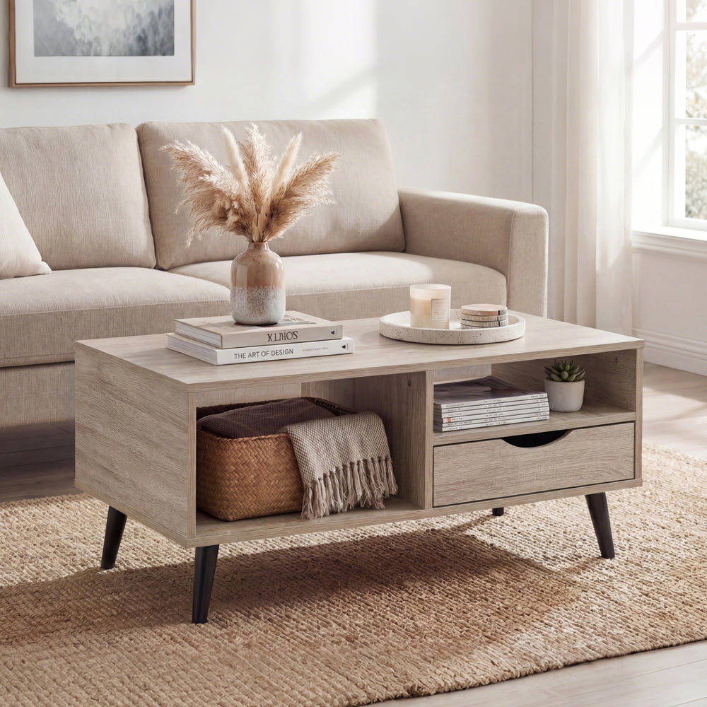 Rustic rectangle coffee table with storage, featuring open shelves, a drawer, and splayed legs for stylish living room.