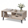 Rustic rectangle coffee table showcasing a spacious surface with a drawer and open shelves for functional living room.