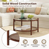 Round coffee table with tempered glass top and hand-woven rattan shelf, crafted from solid wood for living room.