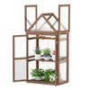 Mini wooden greenhouse with transparent panels, sloping roof, and three removable shelves for plant care and.