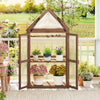 Mini wooden greenhouse with transparent panels and sloping roof, featuring three removable shelves for plant care.